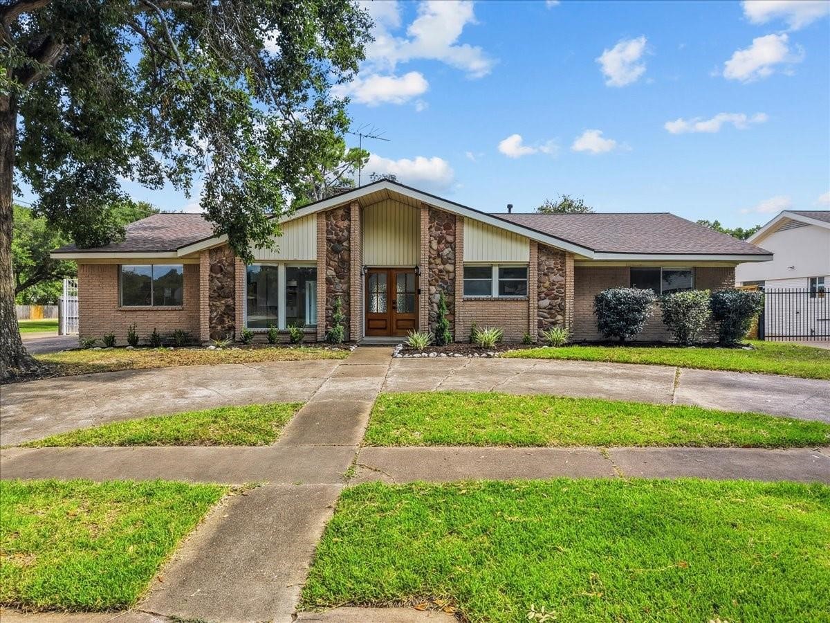 5762 Birdwood Road Houston, TX 77096 - Photo 1 of 49 MID-CENTURY MODERN ELEGANCE, INSIDE AND OUT.