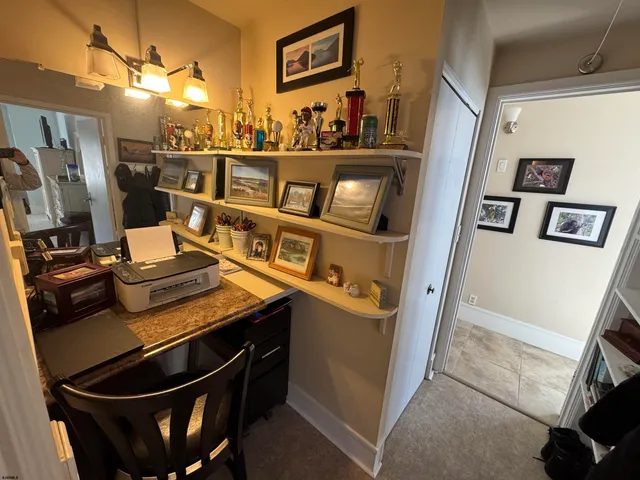 a kitchen with a sink stove and wooden cabinets