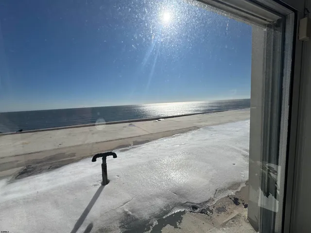 a view of roof with city view