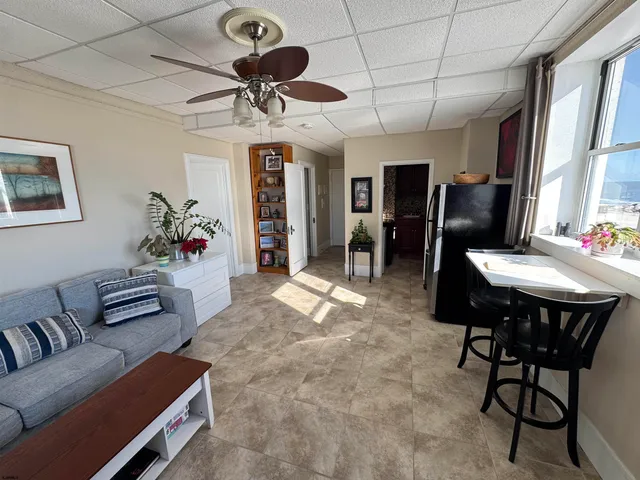 a view of a chandelier in a hall with a chandelier