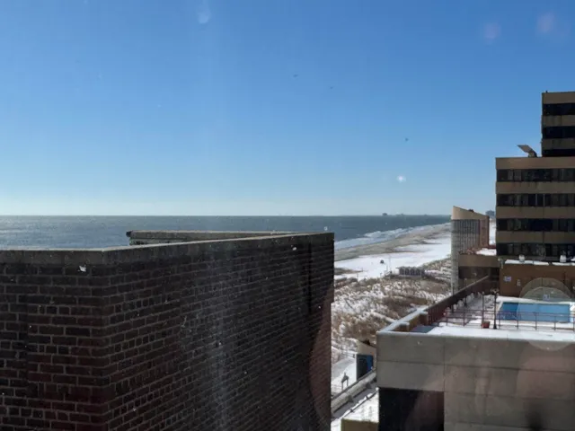 a room with a table and chairs