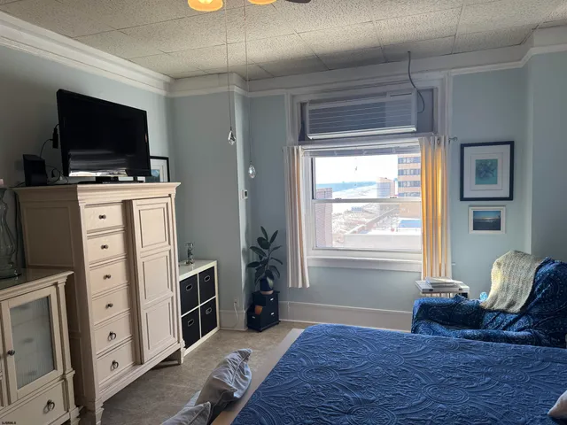 a bathroom with a toilet sink and shower