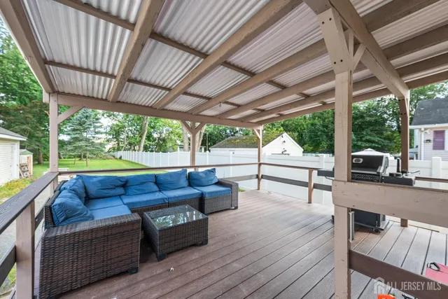 a outdoor living space with furniture and garden view
