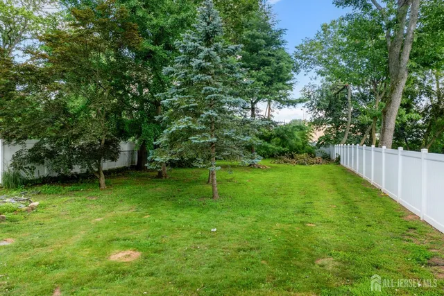 a view of a house with a big yard