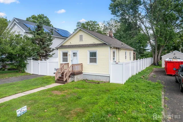 a house view with a garden space