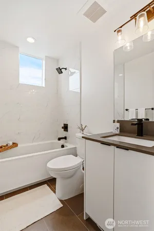 a view of a hallway with washer and dryer