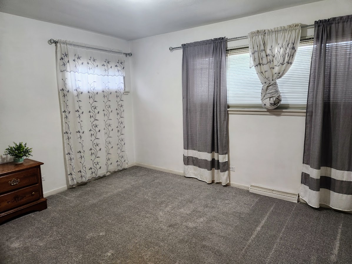 2246 Alta Vista Drive Waukegan, IL 60087 - Photo 19 of 46 a view of empty room with floor to ceiling window