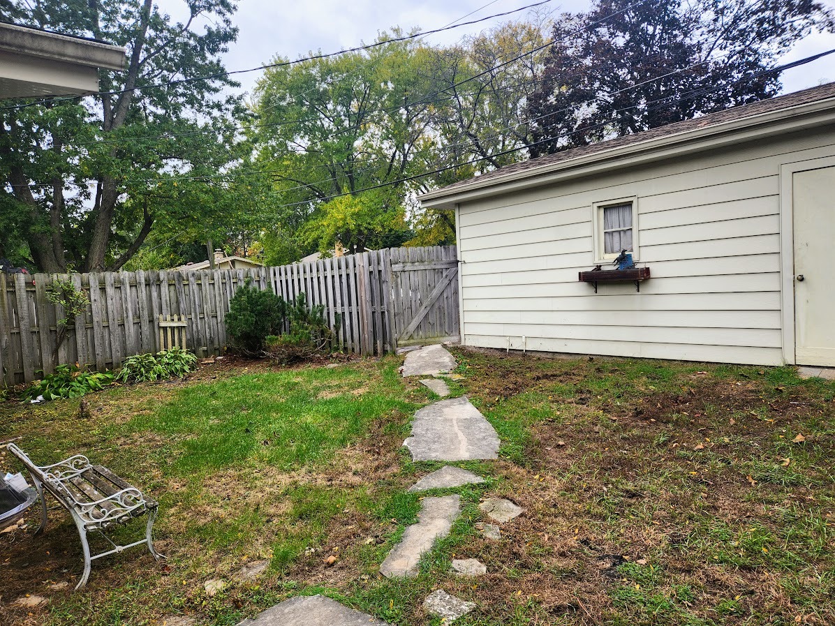2246 Alta Vista Drive Waukegan, IL 60087 - Photo 46 of 46 a front view of a house with garden