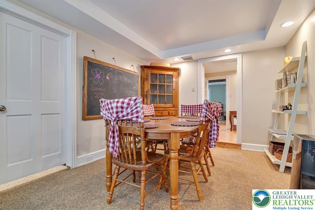 3585 Fairyland Road Lehighton, PA 18235 - Photo 14 of 67 a view of a dining room with furniture and wooden floor