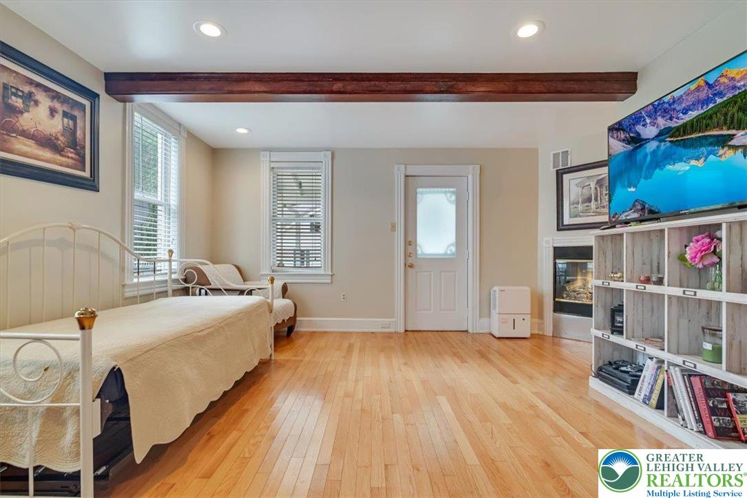 3585 Fairyland Road Lehighton, PA 18235 - Photo 18 of 67 a spacious bedroom with a bed and a book shelf