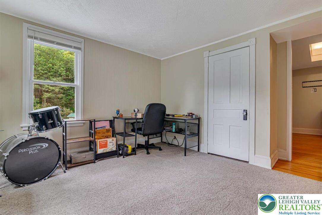 3585 Fairyland Road Lehighton, PA 18235 - Photo 28 of 67 a view of a workspace with a window and lounge chair