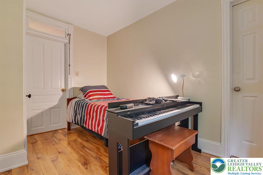 3585 Fairyland Road Lehighton, PA 18235 - Photo 29 of 67 a bedroom with a bed and a window