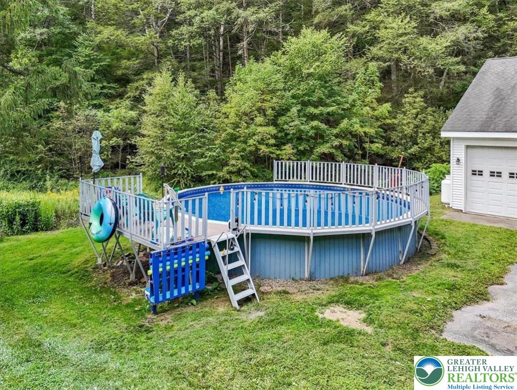 3585 Fairyland Road Lehighton, PA 18235 - Photo 42 of 67 a view of backyard with deck and outdoor seating