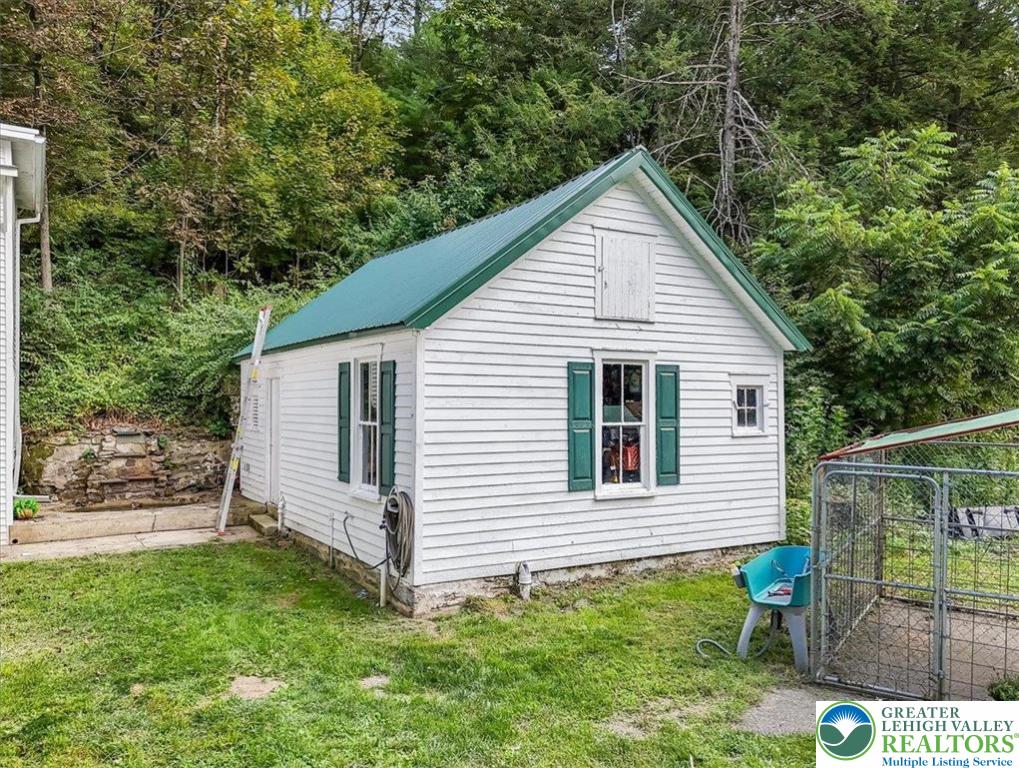 3585 Fairyland Road Lehighton, PA 18235 - Photo 45 of 67 a view of a house with a yard