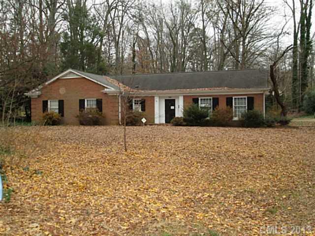 500 Ashworth Road Charlotte, NC 28211 - Photo 1 of 12 front view of a house with a yard