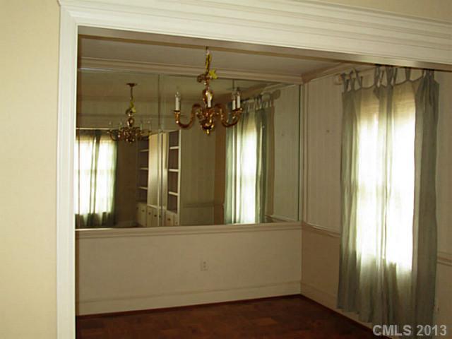 500 Ashworth Road Charlotte, NC 28211 - Photo 3 of 12 a view of a bathroom with a shower and a mirror