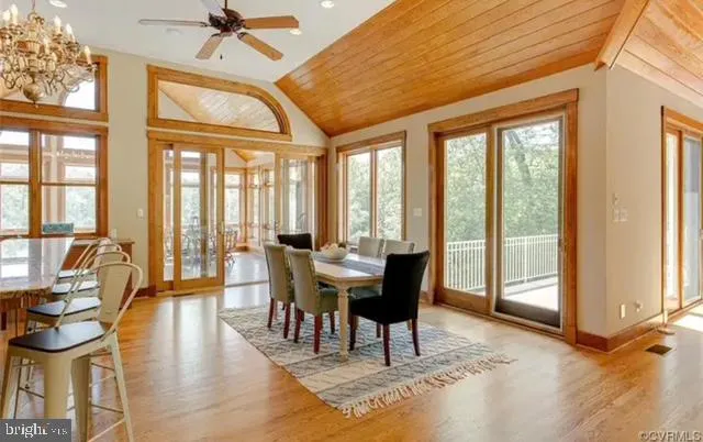 a room with furniture and wooden floor