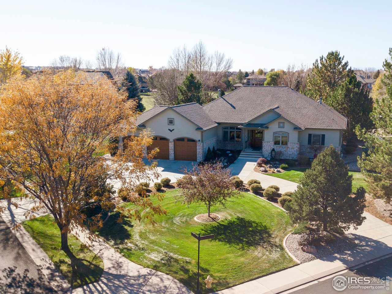 7848 Eagle Ranch Road Fort Collins, CO 80528 - Photo 2 of 46 a aerial view of a house with garden