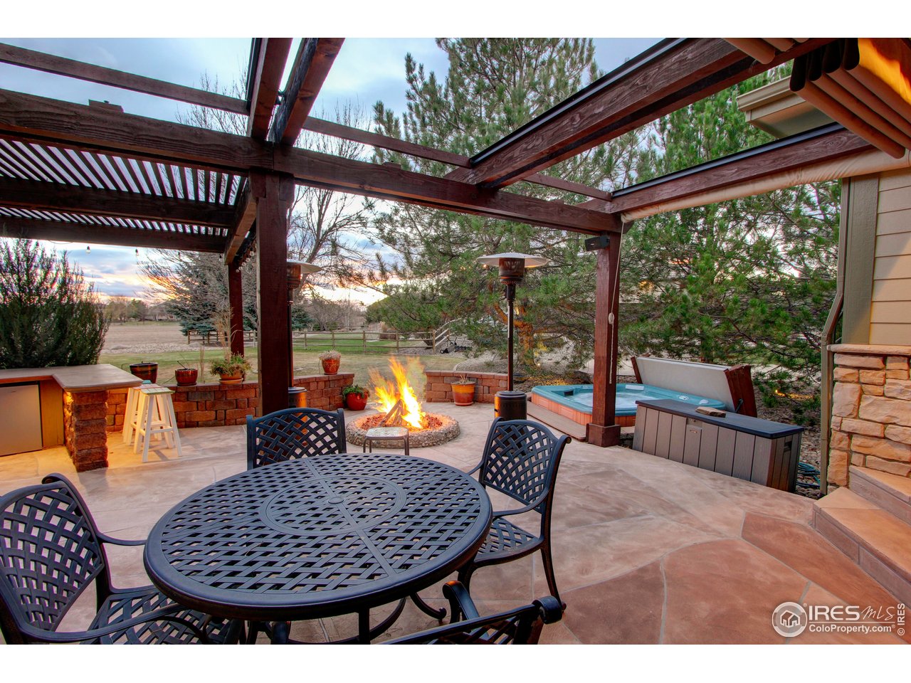 7848 Eagle Ranch Road Fort Collins, CO 80528 - Photo 39 of 46 a outdoor dining space with furniture and garden view