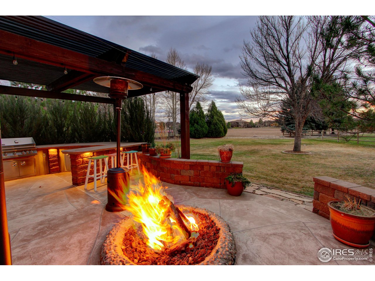 7848 Eagle Ranch Road Fort Collins, CO 80528 - Photo 43 of 46 a view of a swimming pool with a patio