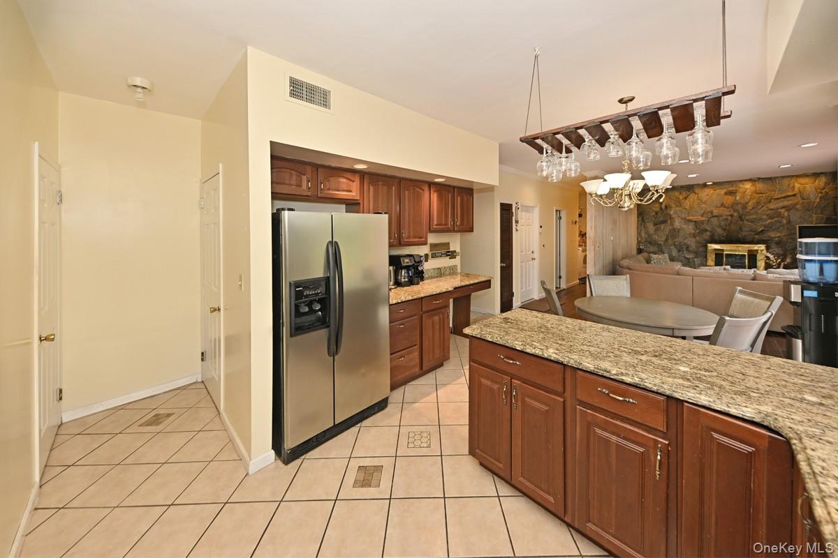 19 Sterling Road Spring Valley, NY 10977 - Photo 6 of 20 a kitchen with stainless steel appliances granite countertop a refrigerator and a sink