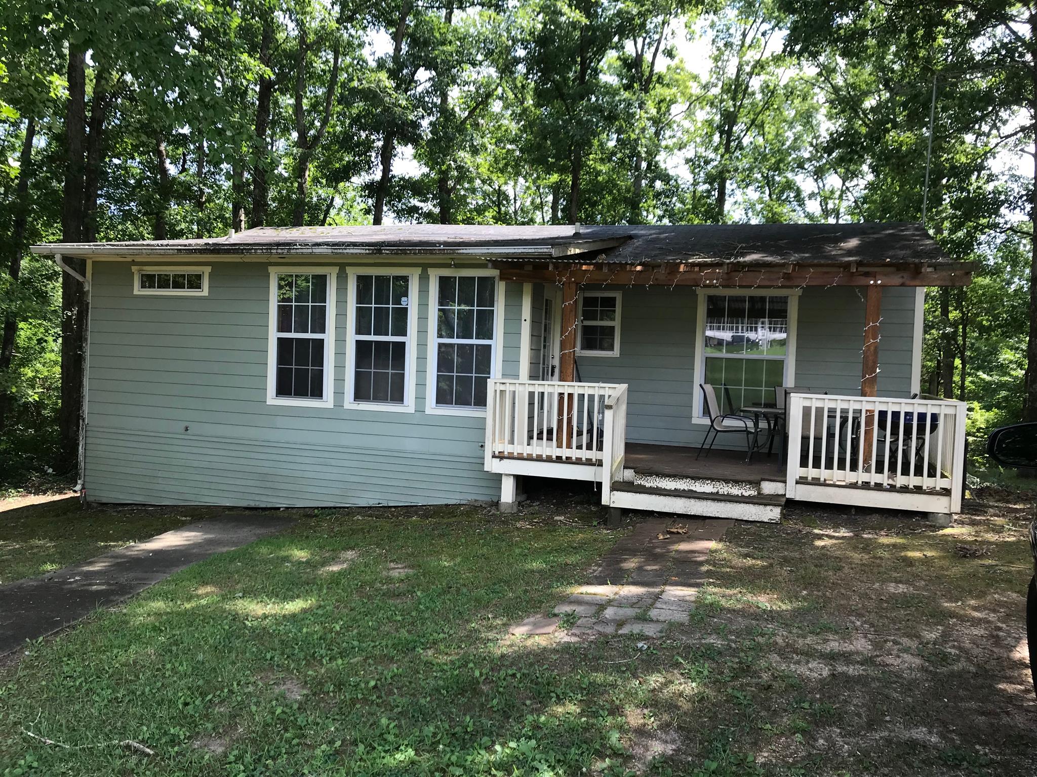 524 Sam Hollow Road Dickson, TN 37055 - Photo 1 of 13 a view of a house with a yard and deck