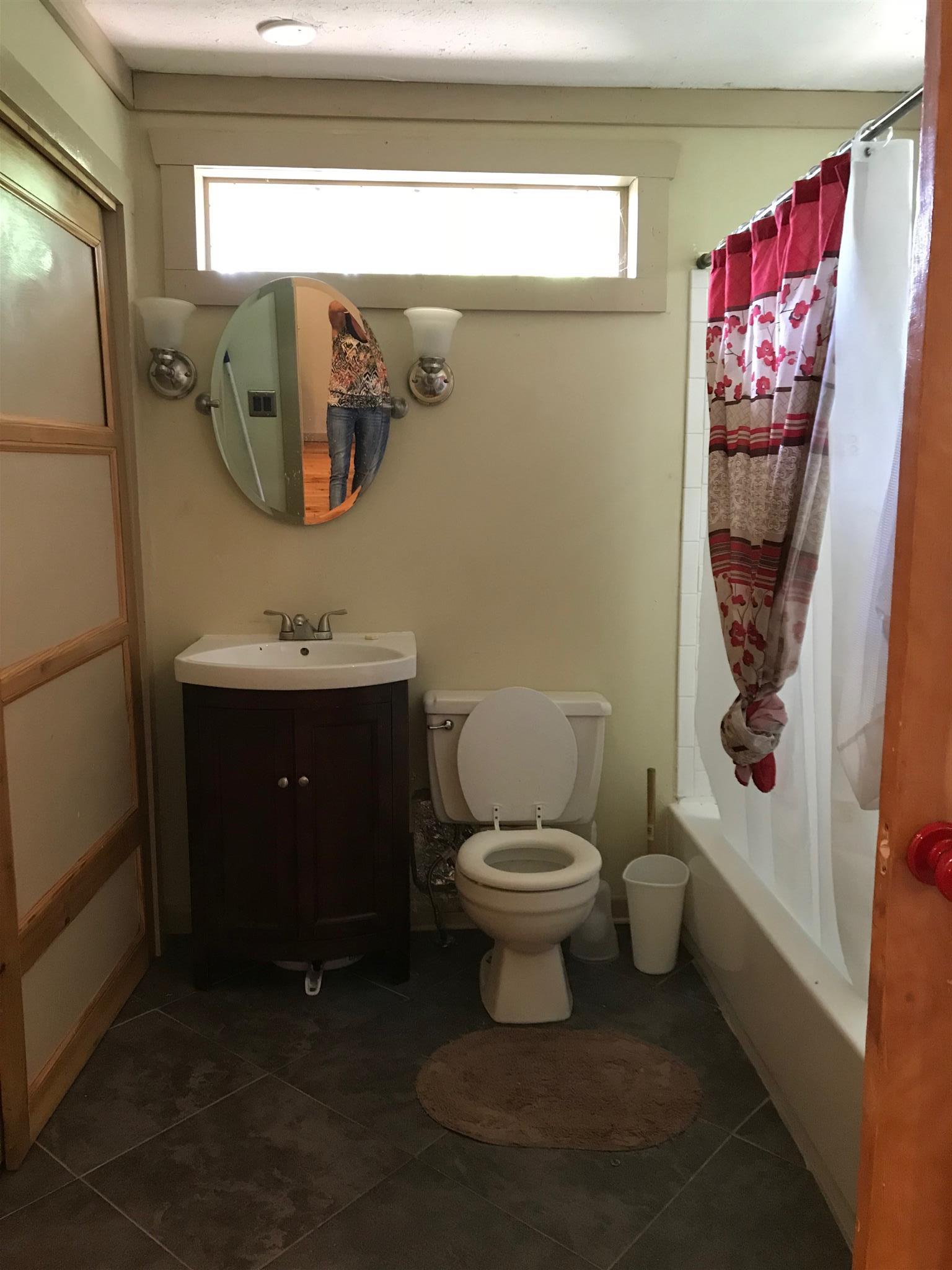 524 Sam Hollow Road Dickson, TN 37055 - Photo 13 of 13 a bathroom with a toilet sink and mirror