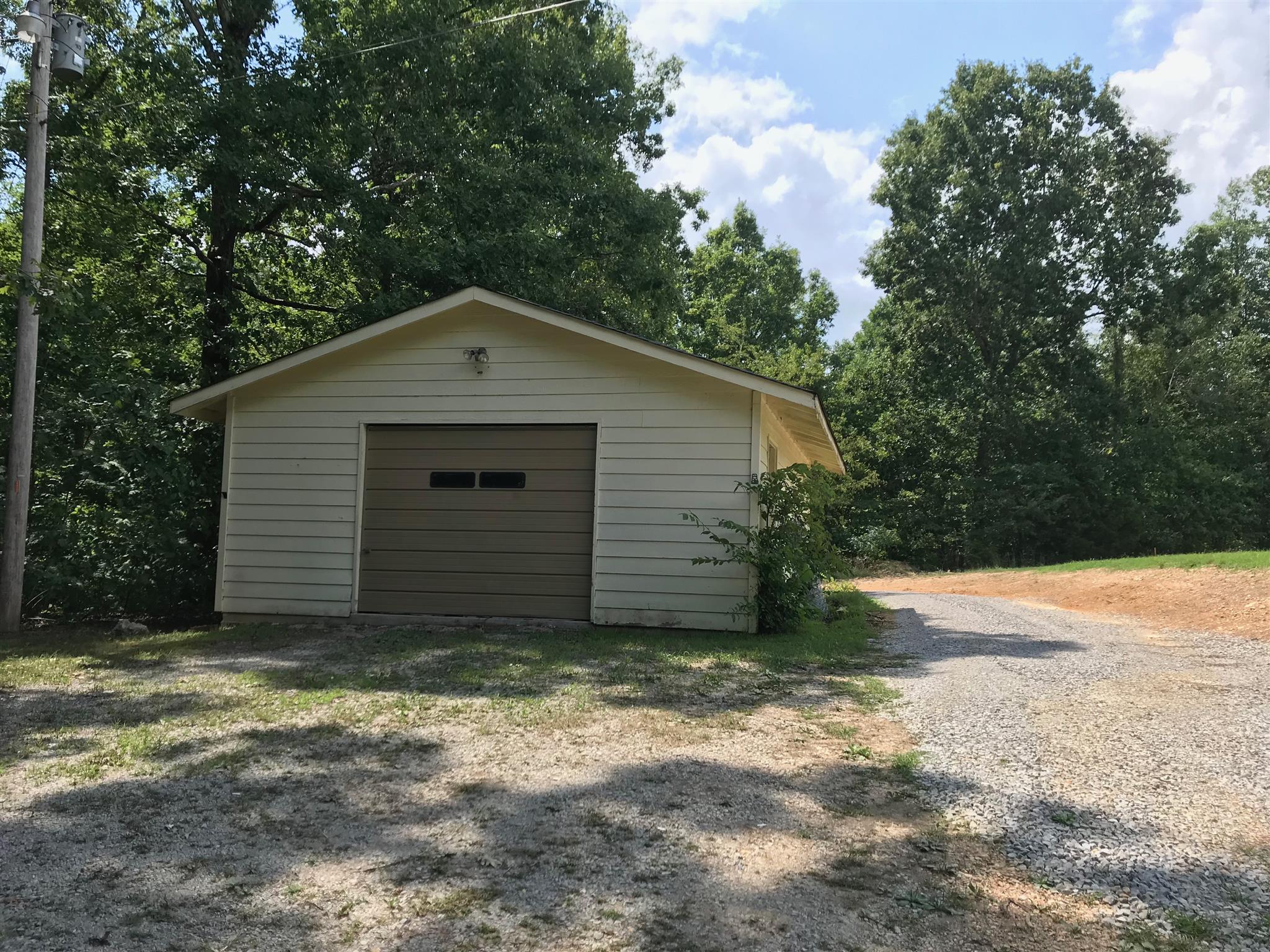 524 Sam Hollow Road Dickson, TN 37055 - Photo 2 of 13 a house with a yard
