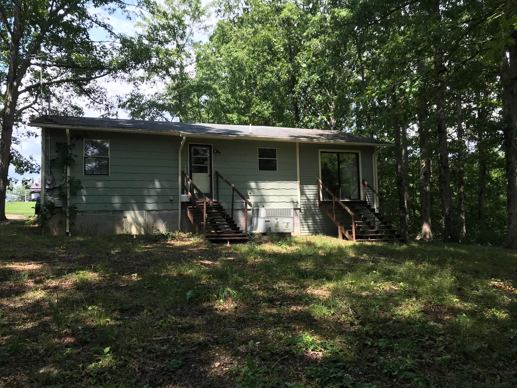 524 Sam Hollow Road Dickson, TN 37055 - Photo 3 of 13 a view of a house with backyard