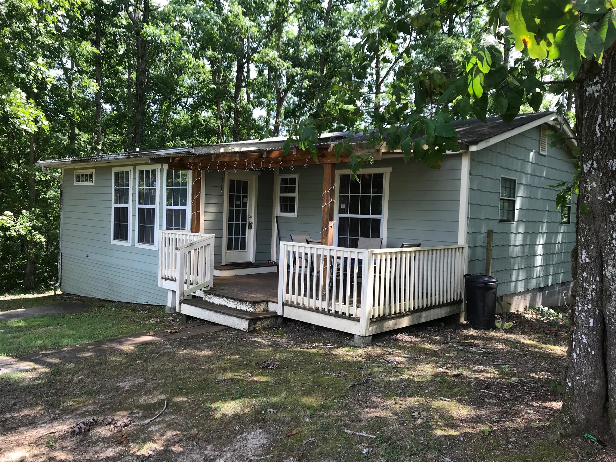 524 Sam Hollow Road Dickson, TN 37055 - Photo 5 of 13 a view of a house with a small yard and wooden fence