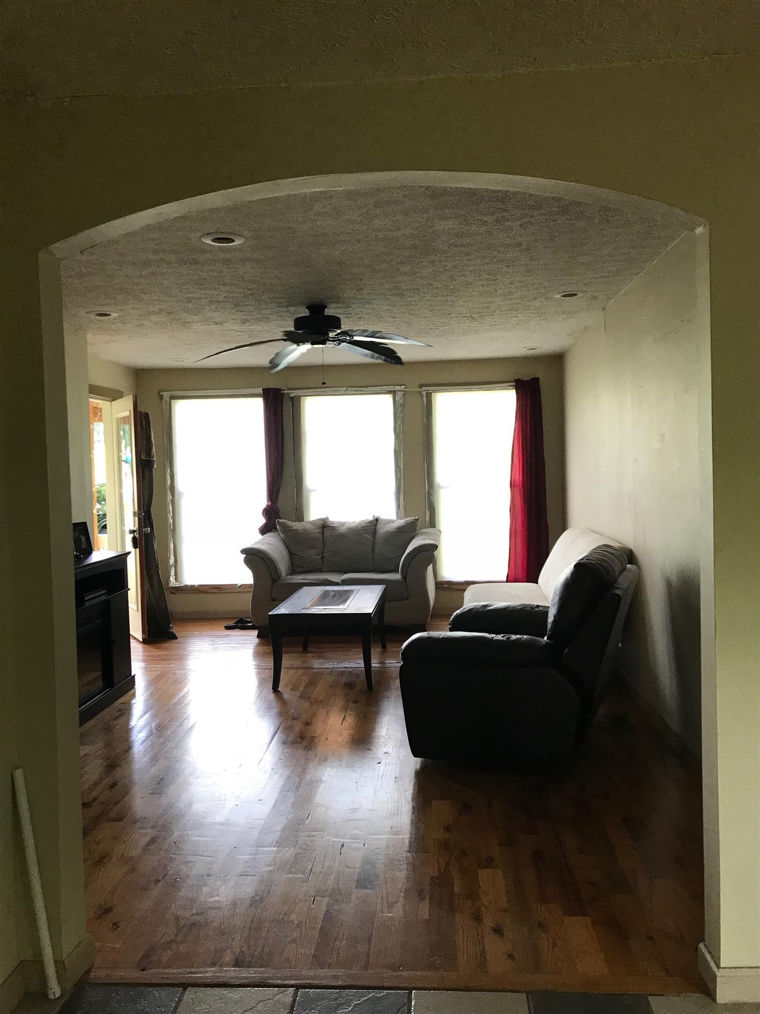 524 Sam Hollow Road Dickson, TN 37055 - Photo 6 of 13 a living room with furniture and a fireplace