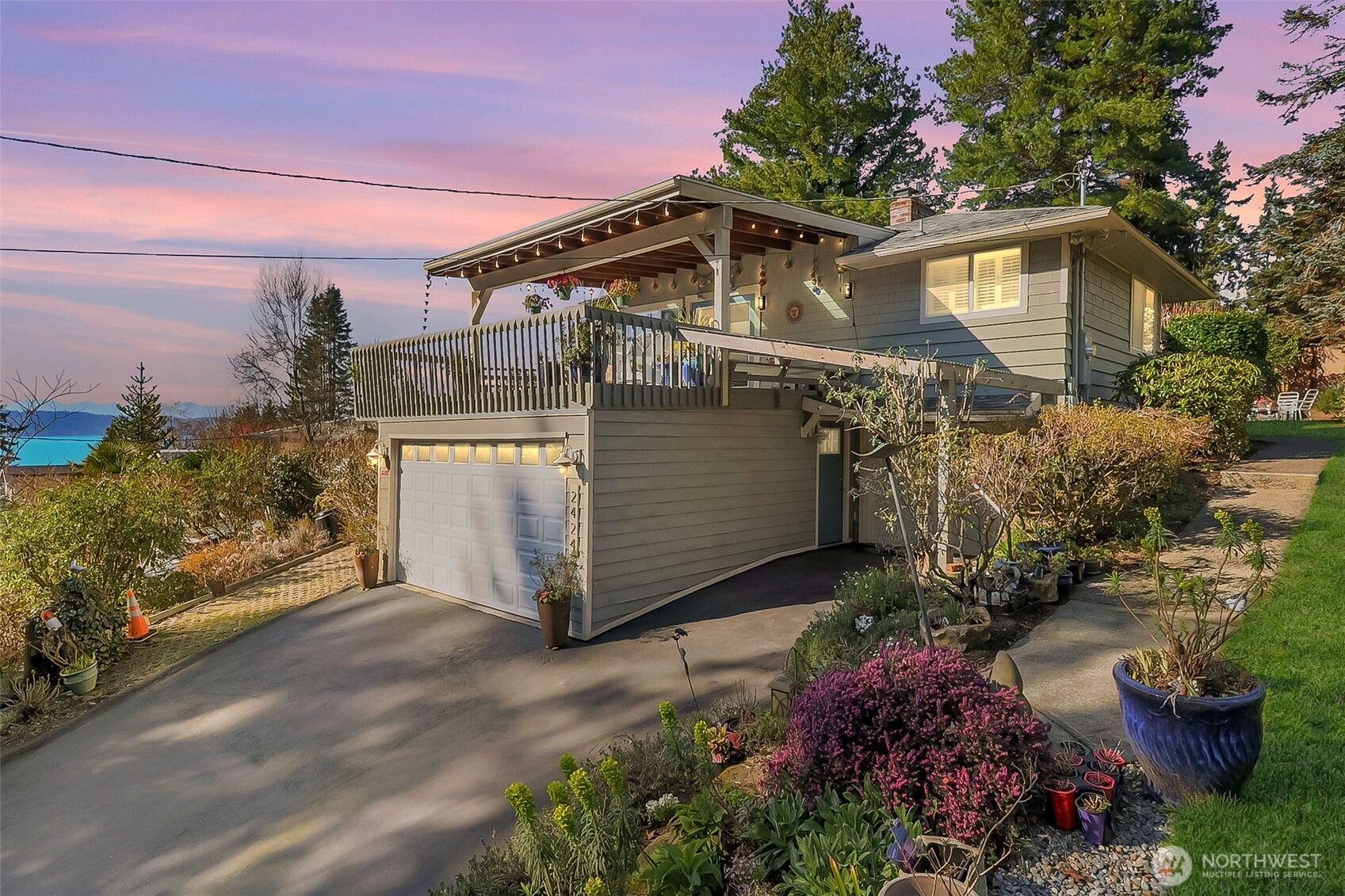 2424 Southwest 152nd Street Burien, WA 98166 - Photo 1 of 39 a front view of a house with a yard
