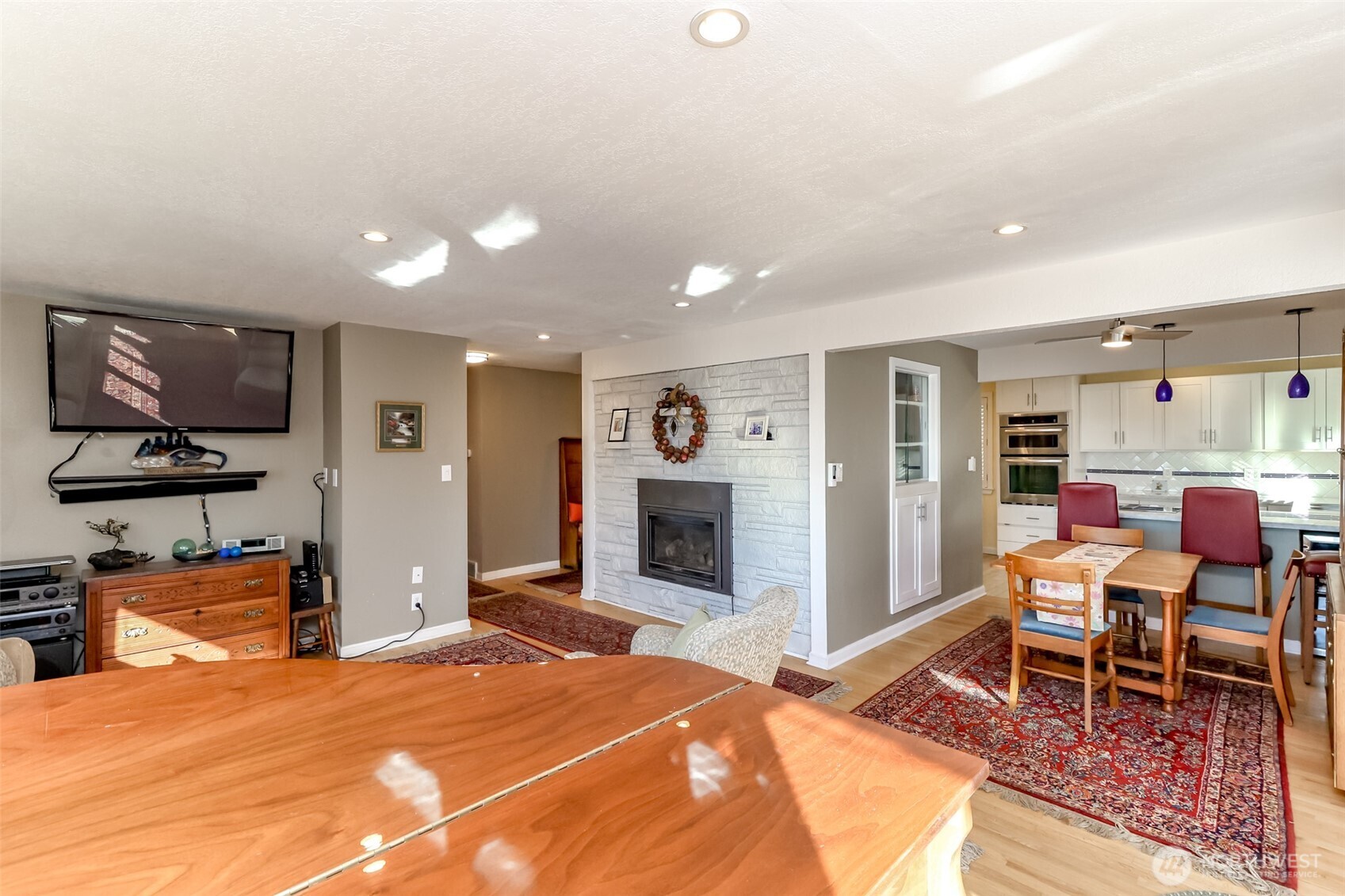 2424 Southwest 152nd Street Burien, WA 98166 - Photo 13 of 39 a bedroom with furniture and a flat screen tv