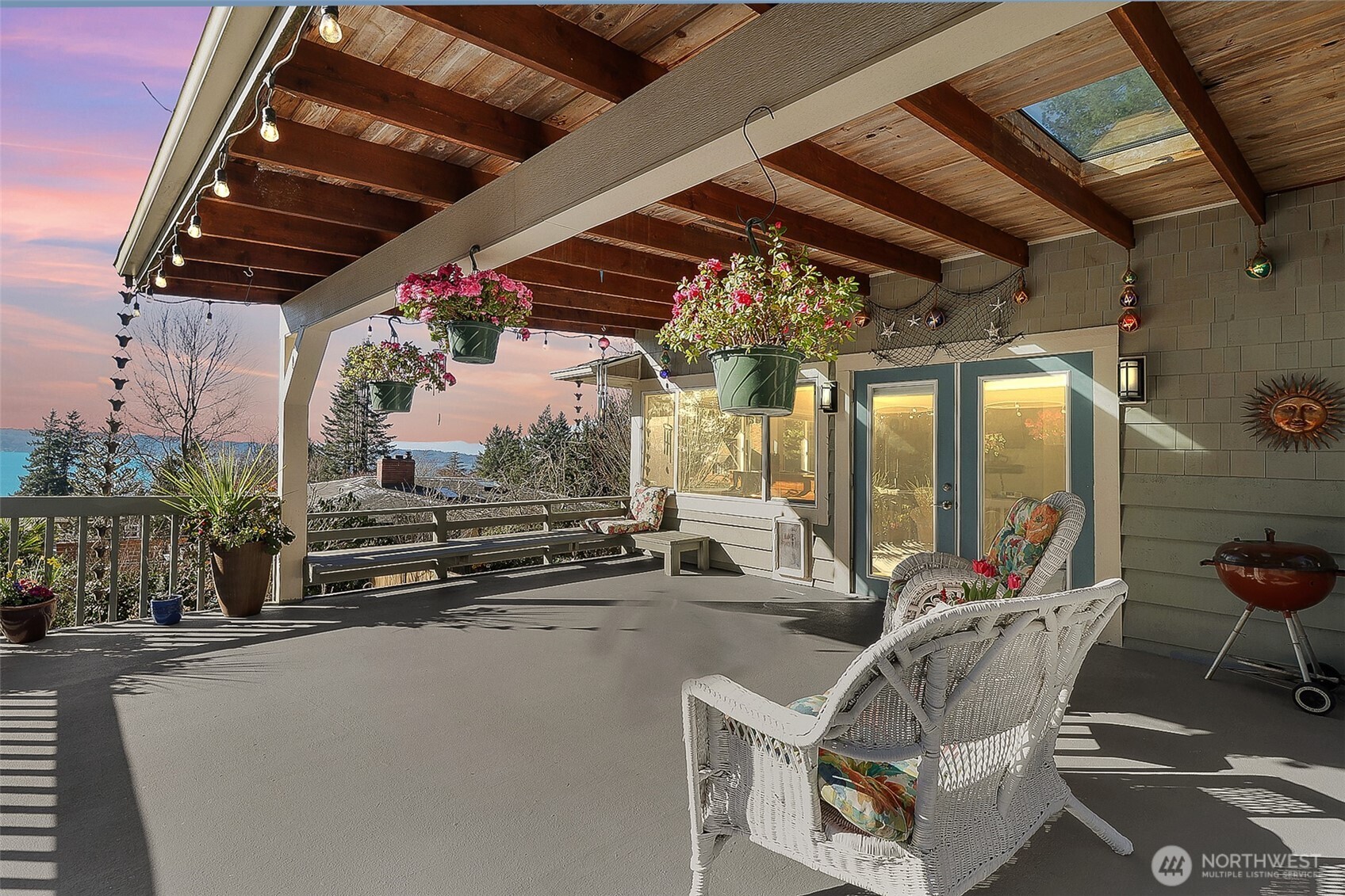 2424 Southwest 152nd Street Burien, WA 98166 - Photo 2 of 39 a view of a patio with a table and chairs