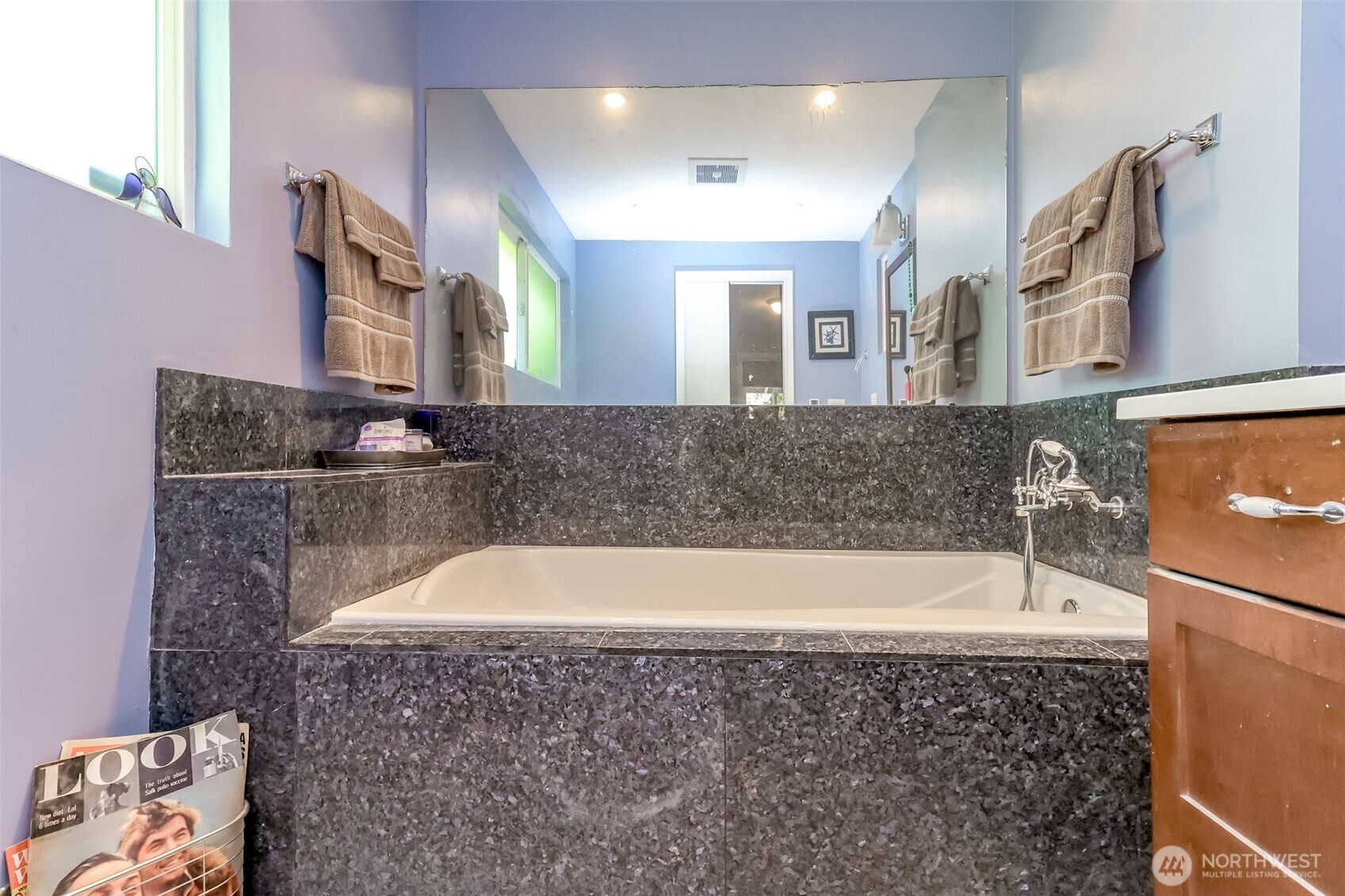 2424 Southwest 152nd Street Burien, WA 98166 - Photo 23 of 39 a bathroom with a bathtub and a sink