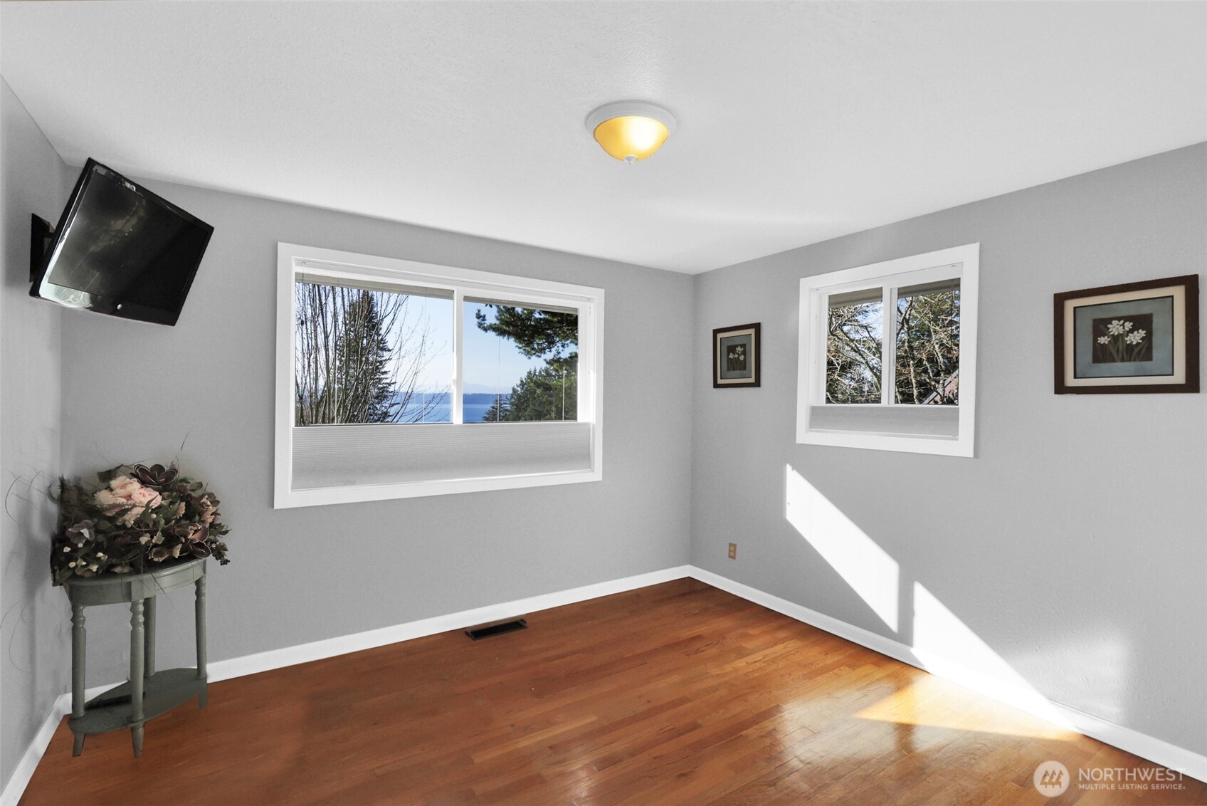 2424 Southwest 152nd Street Burien, WA 98166 - Photo 24 of 39 a view of livingroom with furniture wooden floor and window