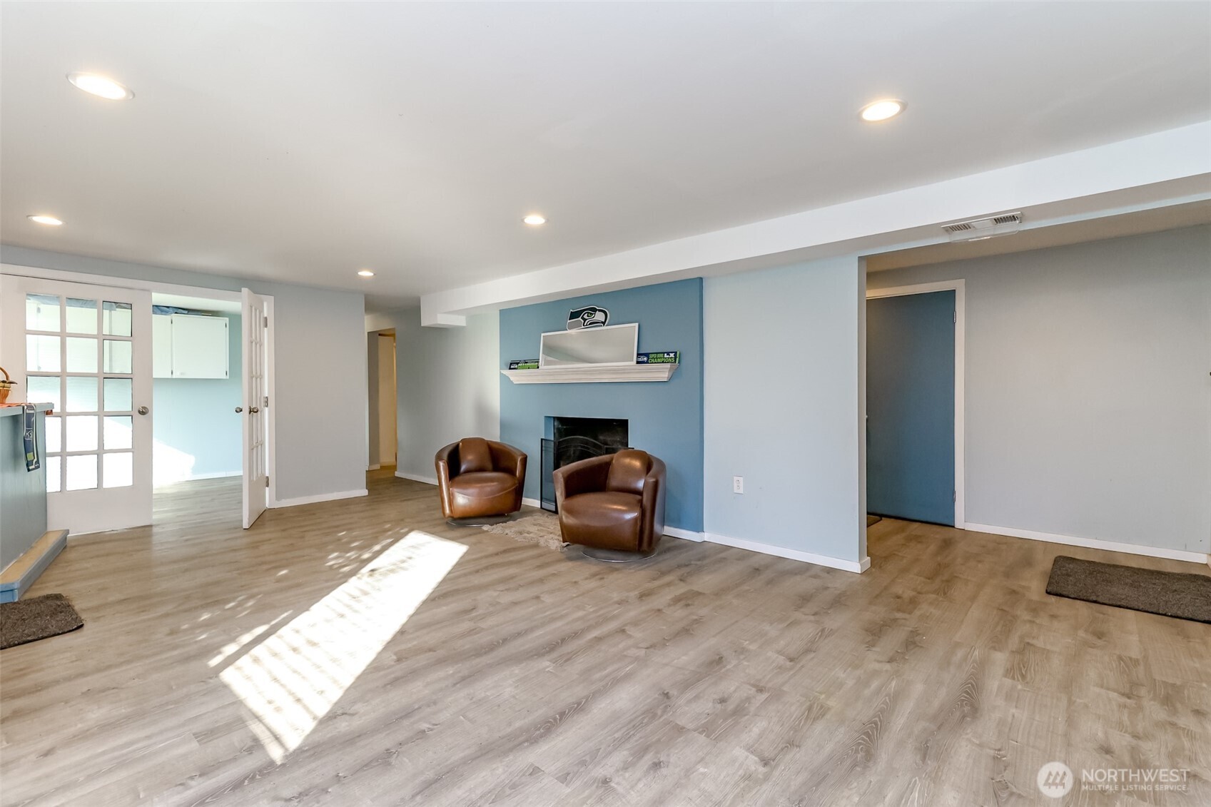 2424 Southwest 152nd Street Burien, WA 98166 - Photo 26 of 39 a view of a livingroom with furniture and wooden floor