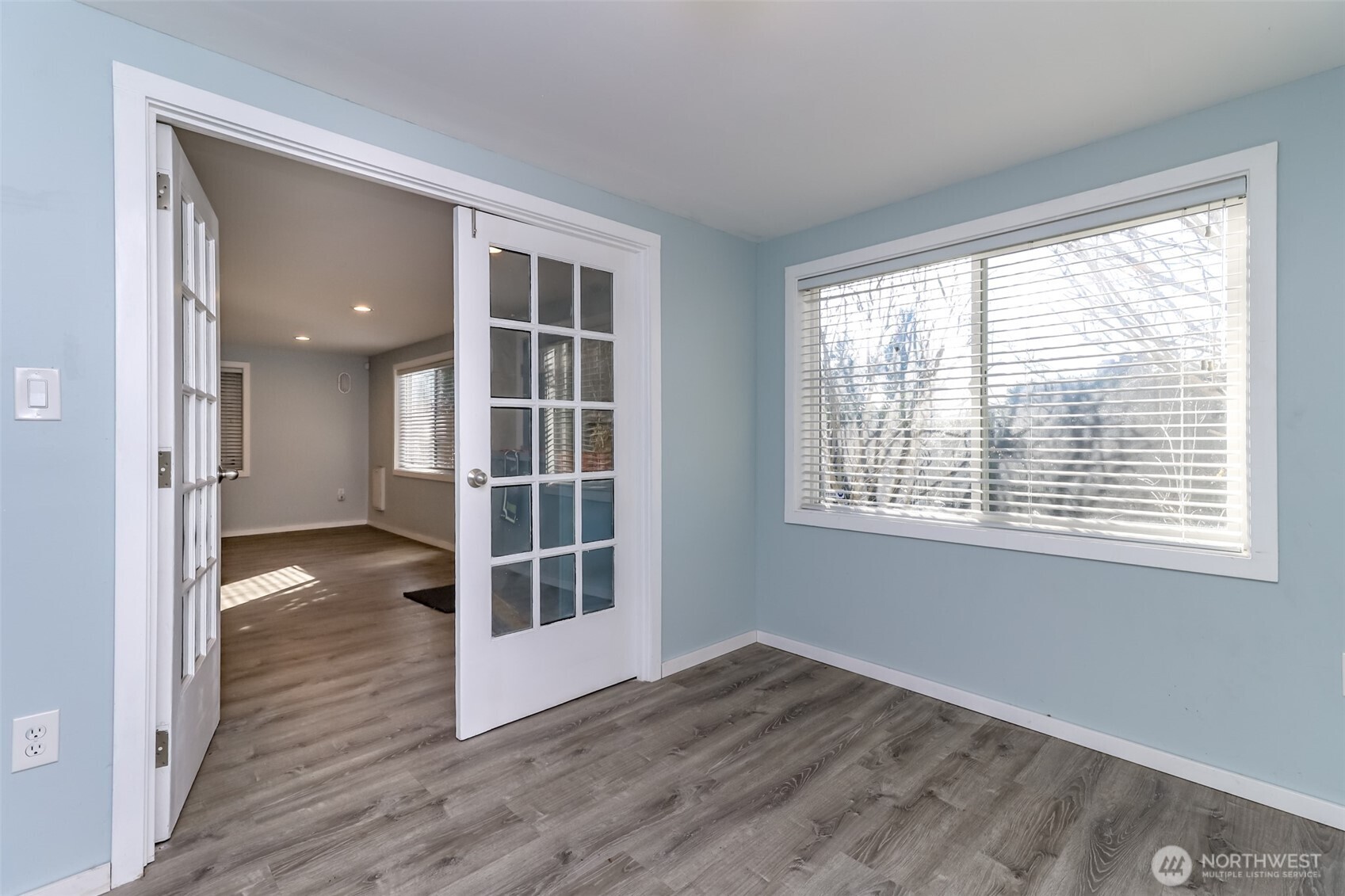2424 Southwest 152nd Street Burien, WA 98166 - Photo 27 of 39 a view of wooden floor and windows in a room