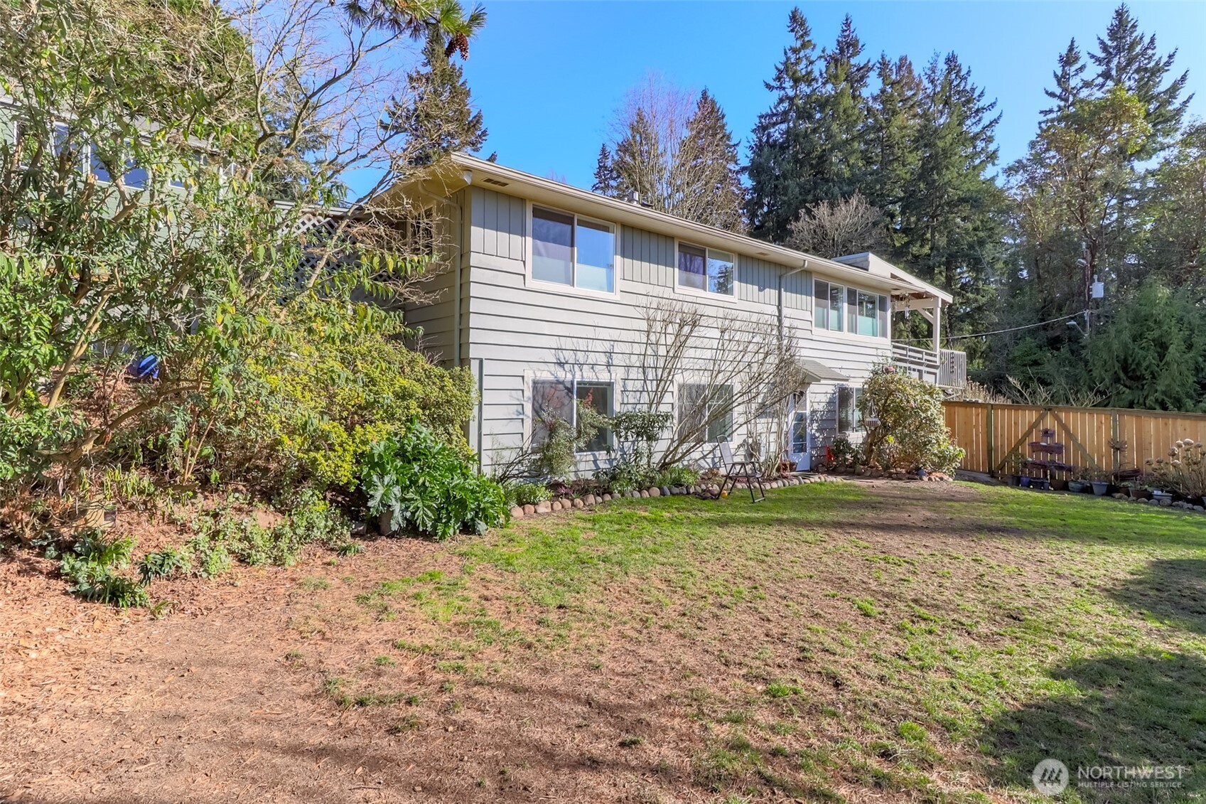 2424 Southwest 152nd Street Burien, WA 98166 - Photo 34 of 39 a view of a house with a yard