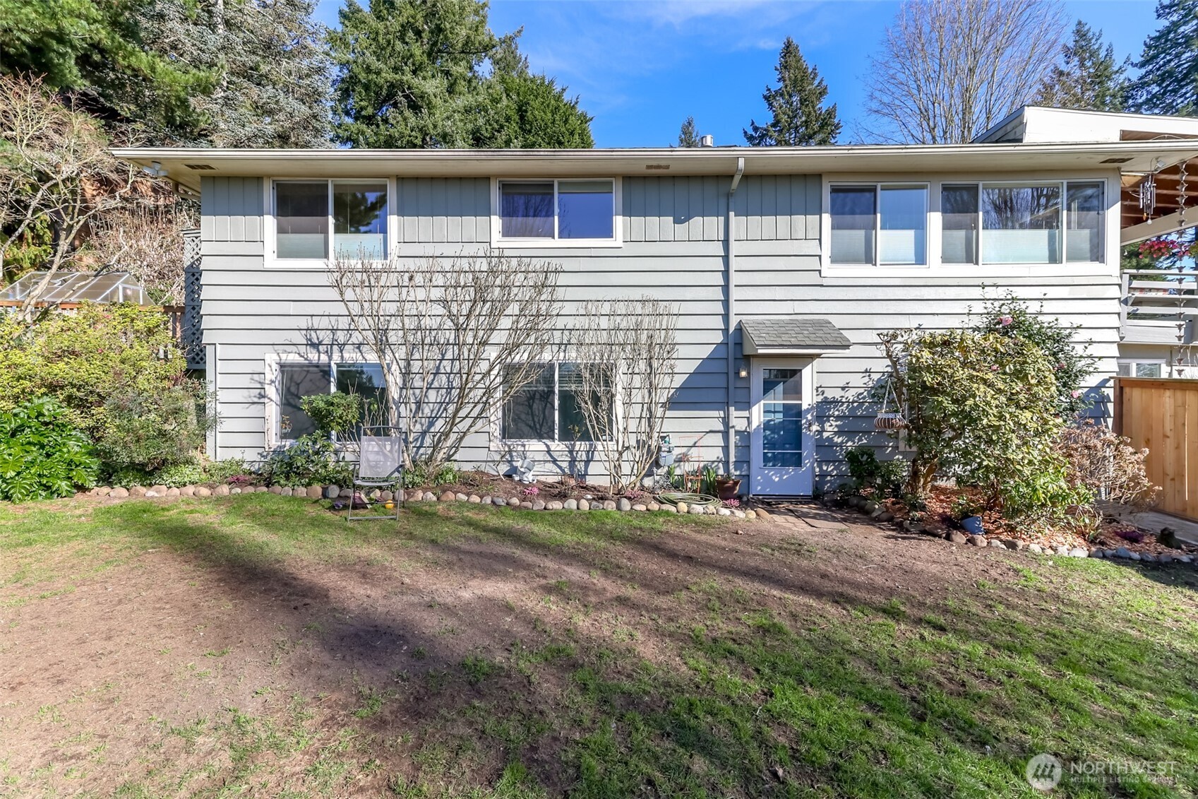 2424 Southwest 152nd Street Burien, WA 98166 - Photo 35 of 39 a view of a house with a yard and sitting area