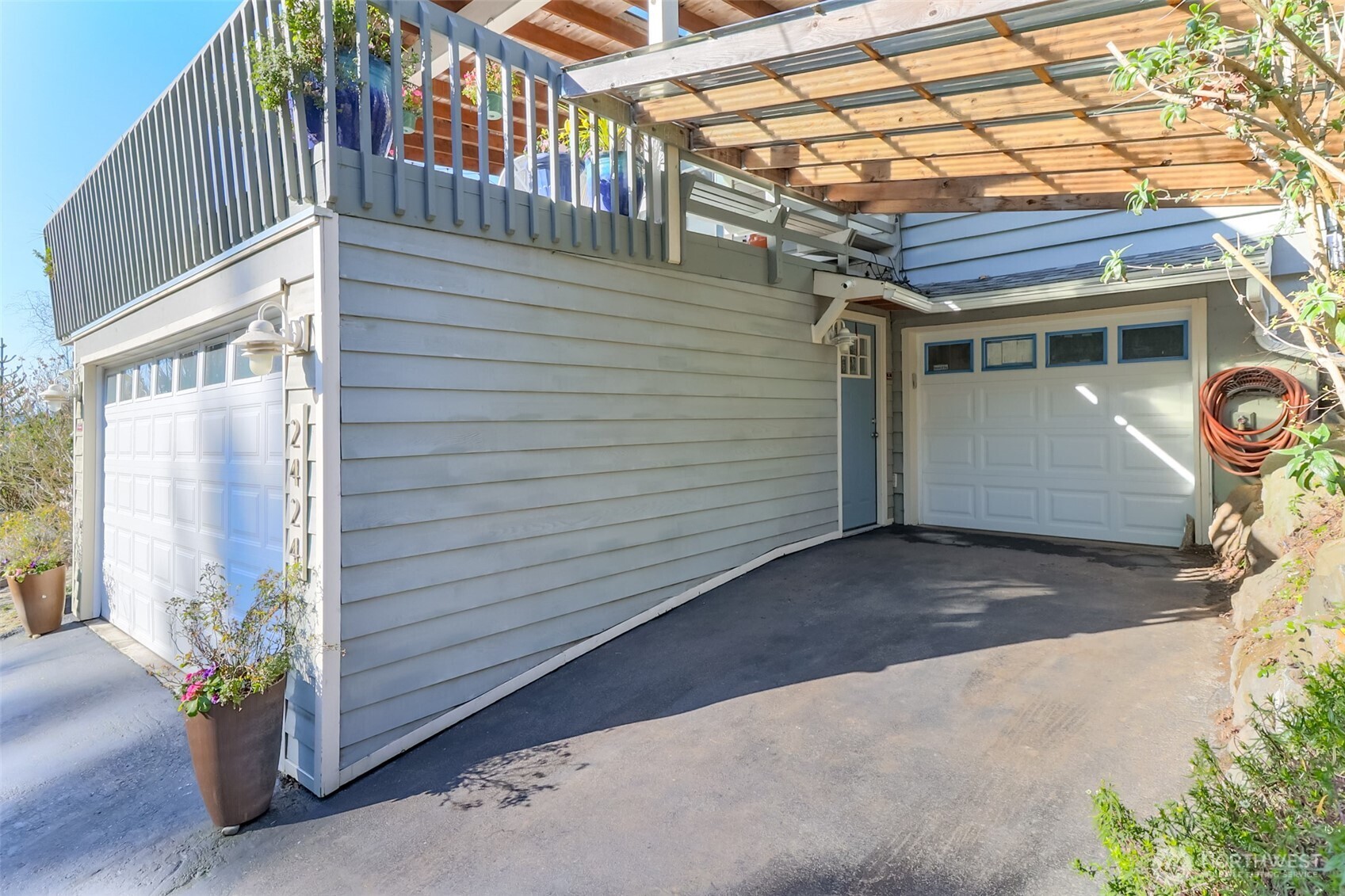 2424 Southwest 152nd Street Burien, WA 98166 - Photo 4 of 39 a view of a house with a garage