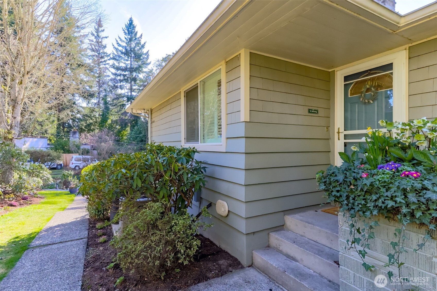 2424 Southwest 152nd Street Burien, WA 98166 - Photo 5 of 39 a view of a backyard with plants