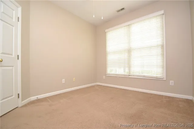 a view of a balcony with a swing