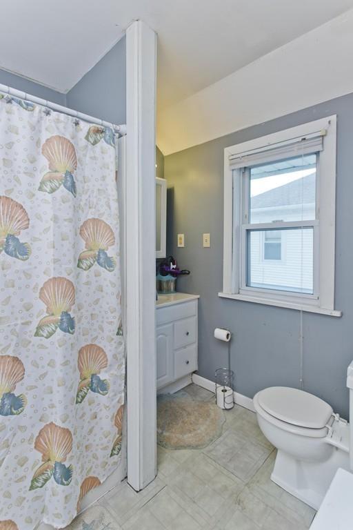 107 Ardmore Street Springfield, MA 01104 - Photo 15 of 30 a bathroom with a granite countertop sink toilet and shower