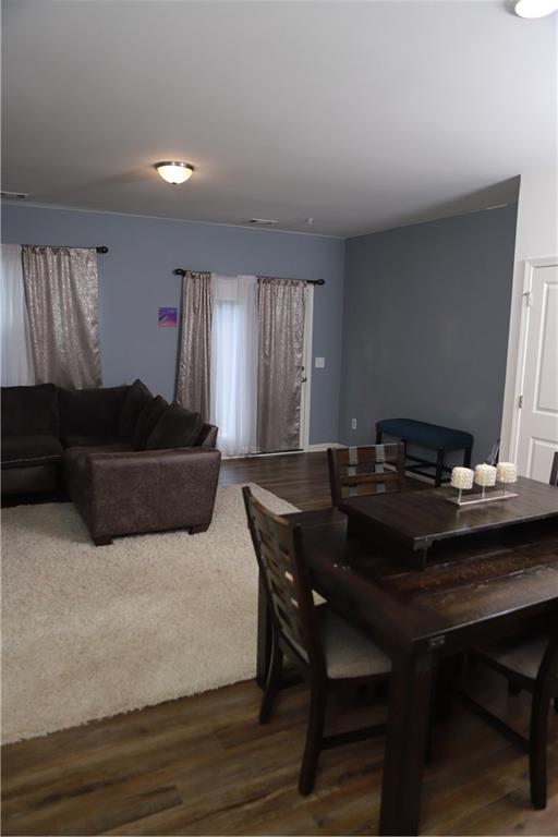 11900 Fuller Street Hampton, GA 30228 - Photo 5 of 17 a living room with furniture and a table