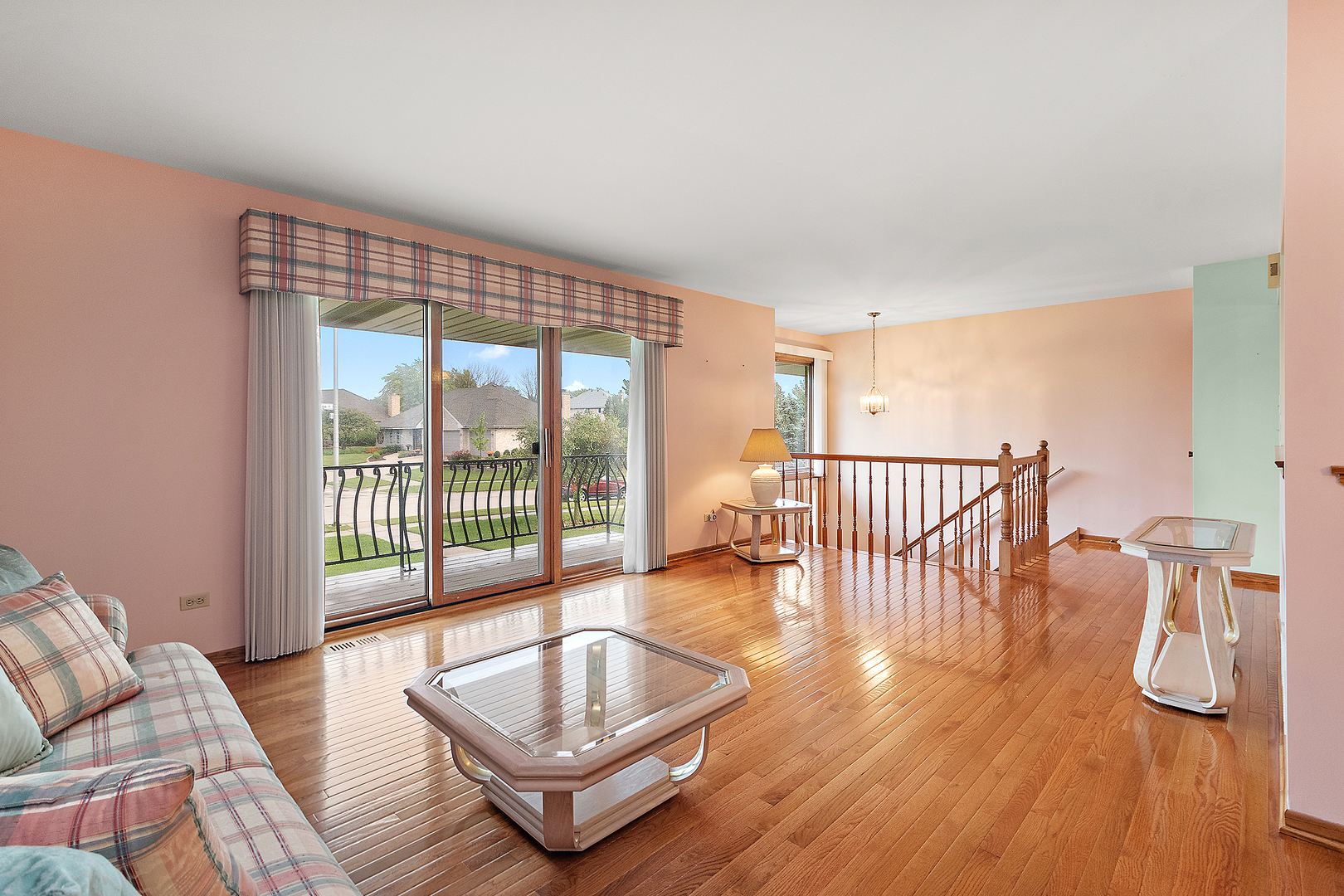 10459 Eagle Ridge Drive, Unit 139 Orland Park, IL 60467 - Photo 5 of 25 a living room with furniture and a large window