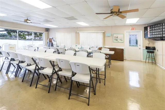 a white house in middle of forest