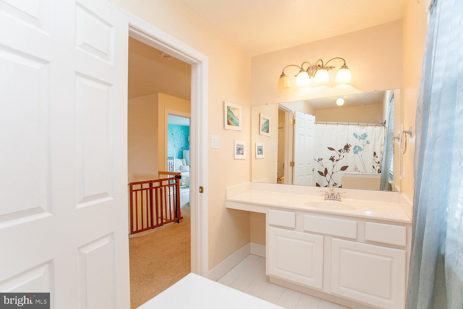 23 Mill Ridge Drive Aston, PA 19014 - Photo 22 of 35 full hall bath looking to 3rd bedroom
