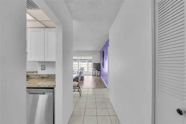 a bathroom with a sink a vanity and a bathtub