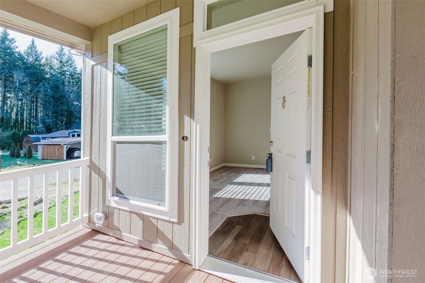 3371 Southeast Bielmeier Road, Unit 95 Port Orchard, WA 98367 - Photo 11 of 40 a view of a bedroom from a balcony